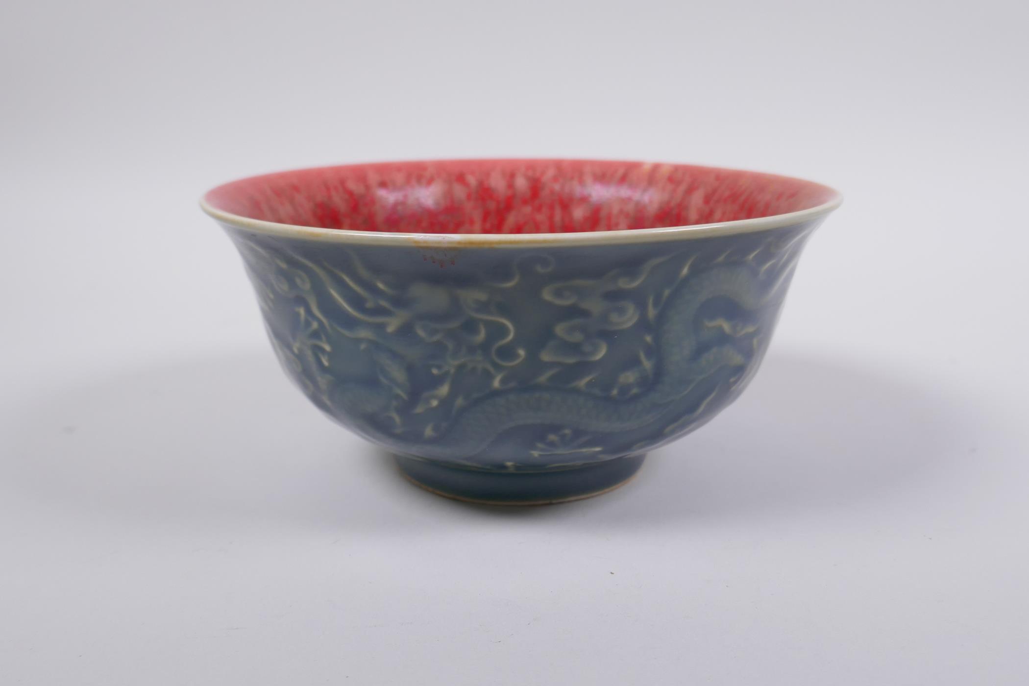 A Chinese porcelain rice bowl with a flambe glazed  interior and blue glazed exterior with - Image 2 of 5