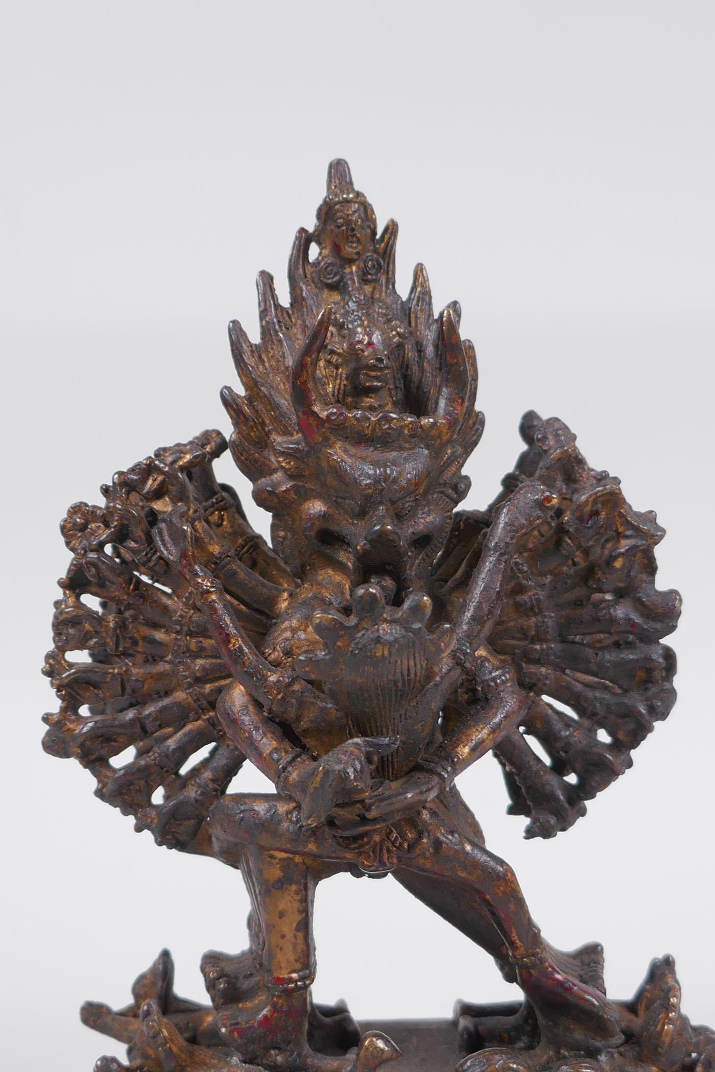 A Tibetan bronze figure of a many armed deity and consort, Chakrasamvara and Vajravahari, double - Image 2 of 6