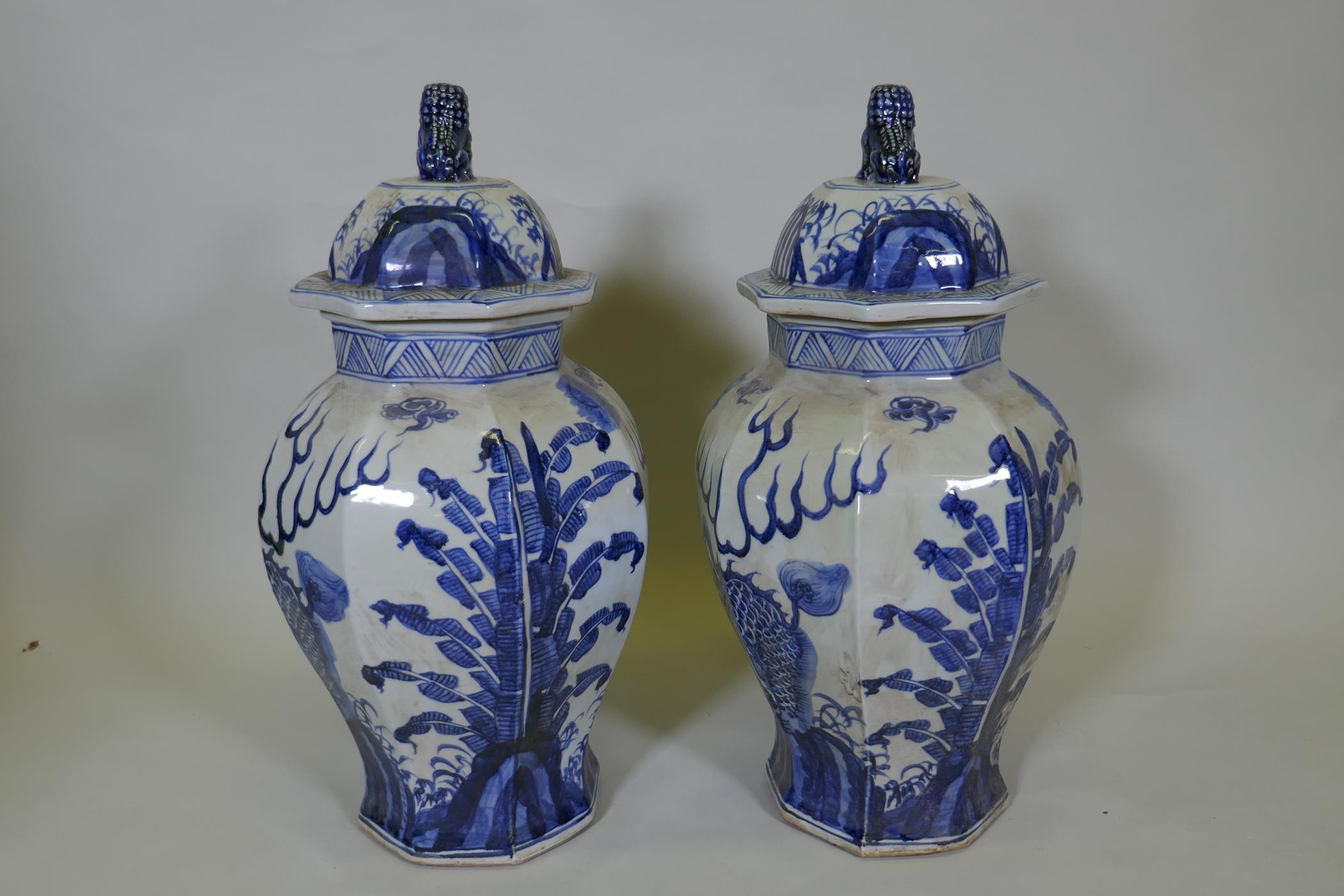 A pair of Chinese blue and white porcelain octagonal jar and covers, decorated with kylin in a - Image 4 of 6