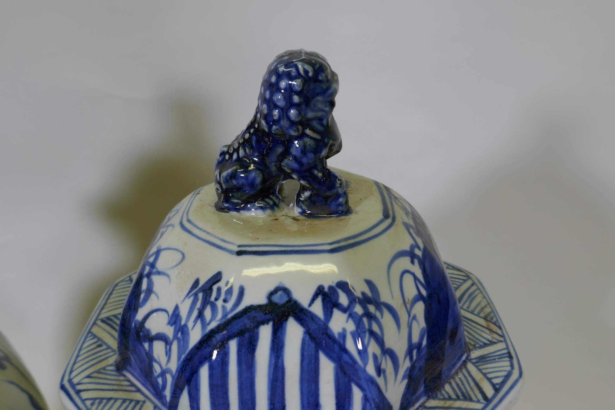 A pair of Chinese blue and white porcelain octagonal jar and covers, decorated with kylin in a - Image 5 of 6