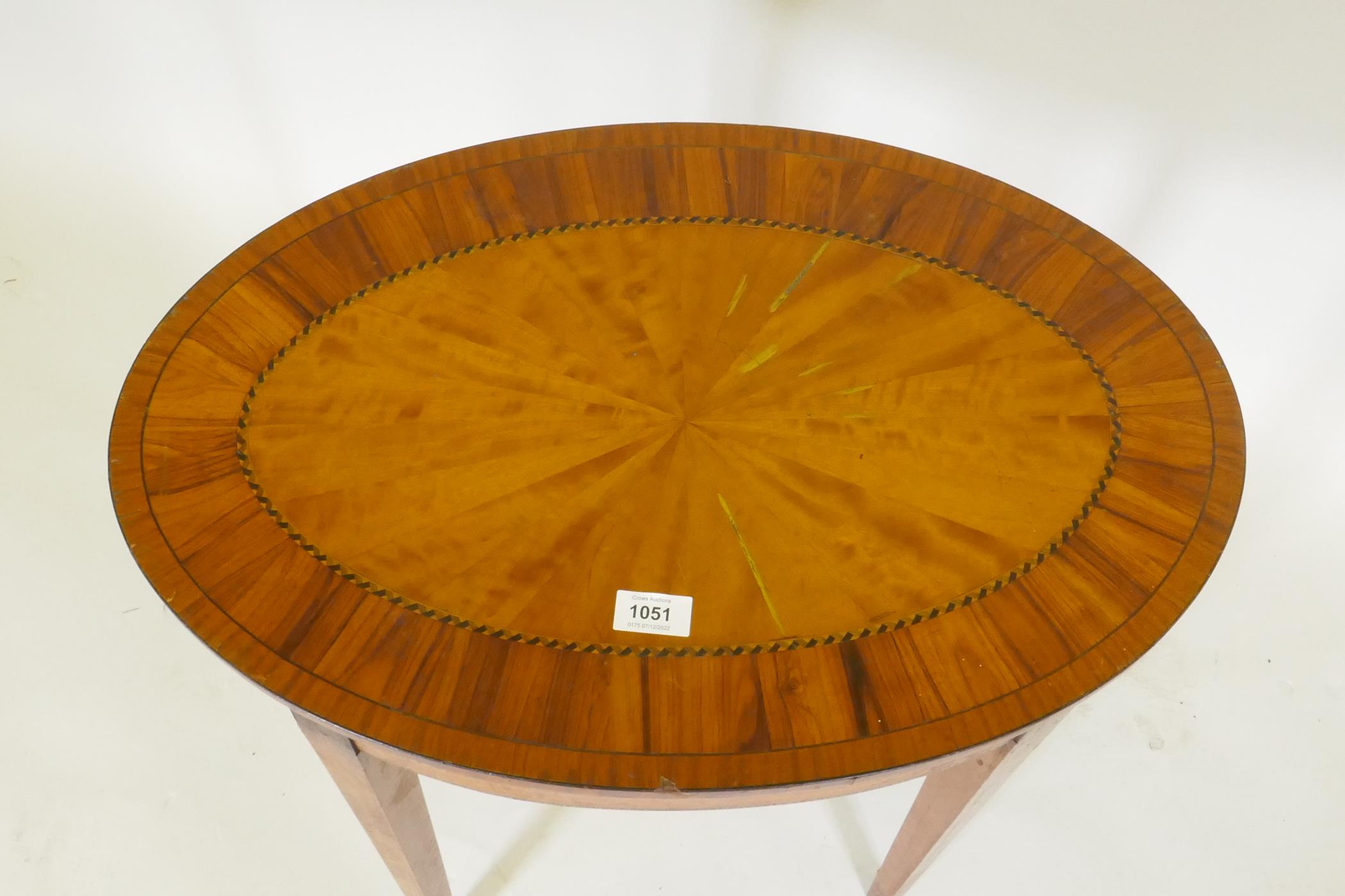 A C19th satinwood occasional table with segmented veneered oval top with laburnum crossbanding, 61 x - Image 2 of 6