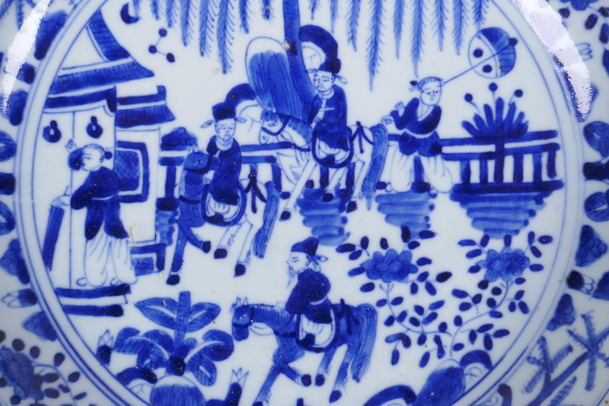 A Chinese Republic blue and white porcelain charger decorated with figures on horseback, 29cm - Image 2 of 4