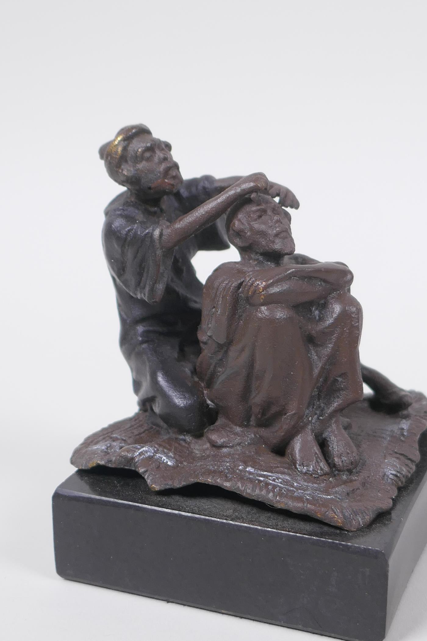 A Bergman style bronze figure of an Arab barber, 8cm high - Image 2 of 5