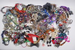 A large quantity of assorted costume jewellery including chains, necklaces, bangles, earrings etc