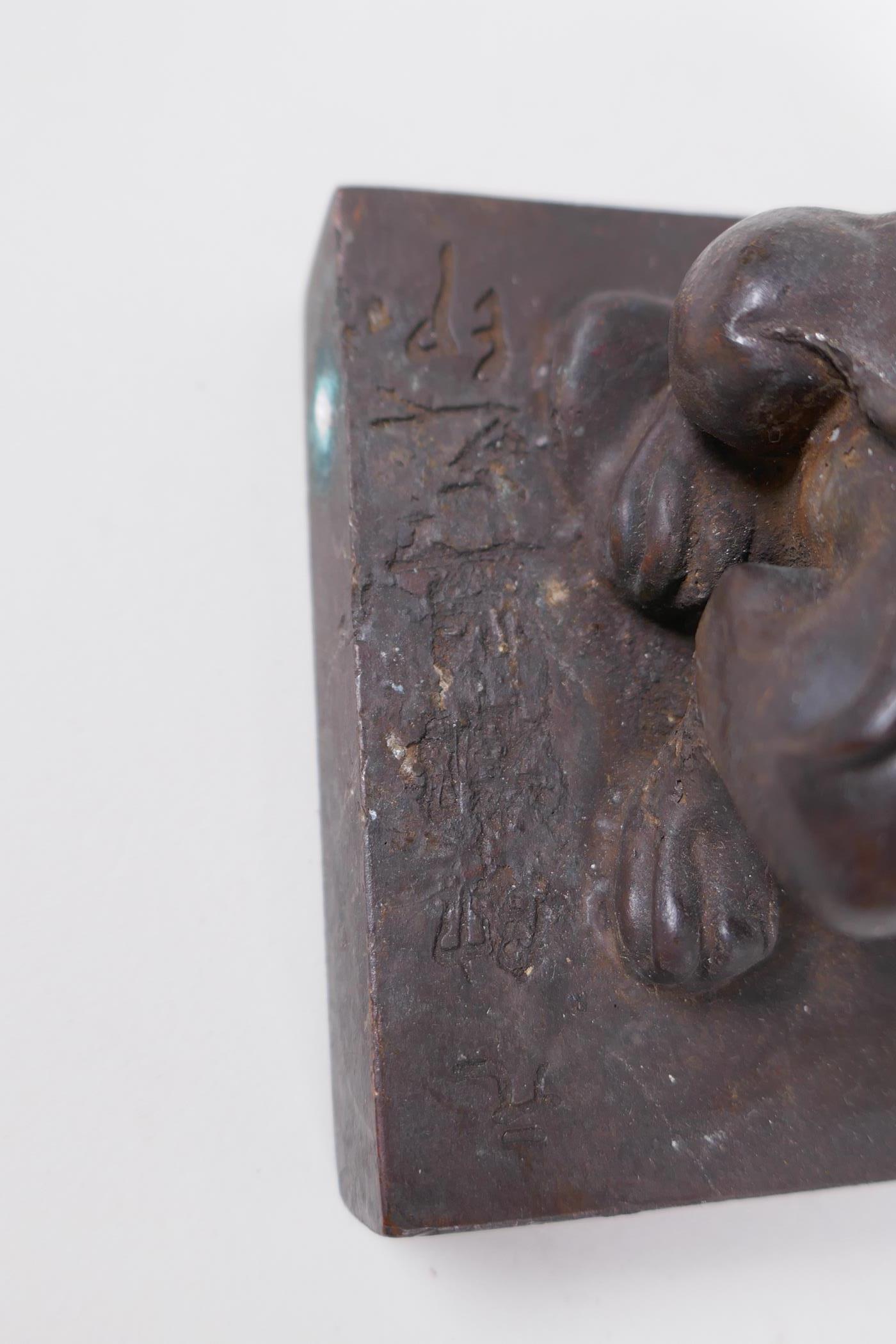 A Chinese bronze seal with a kylin knop, 9 x 9cm - Image 3 of 5