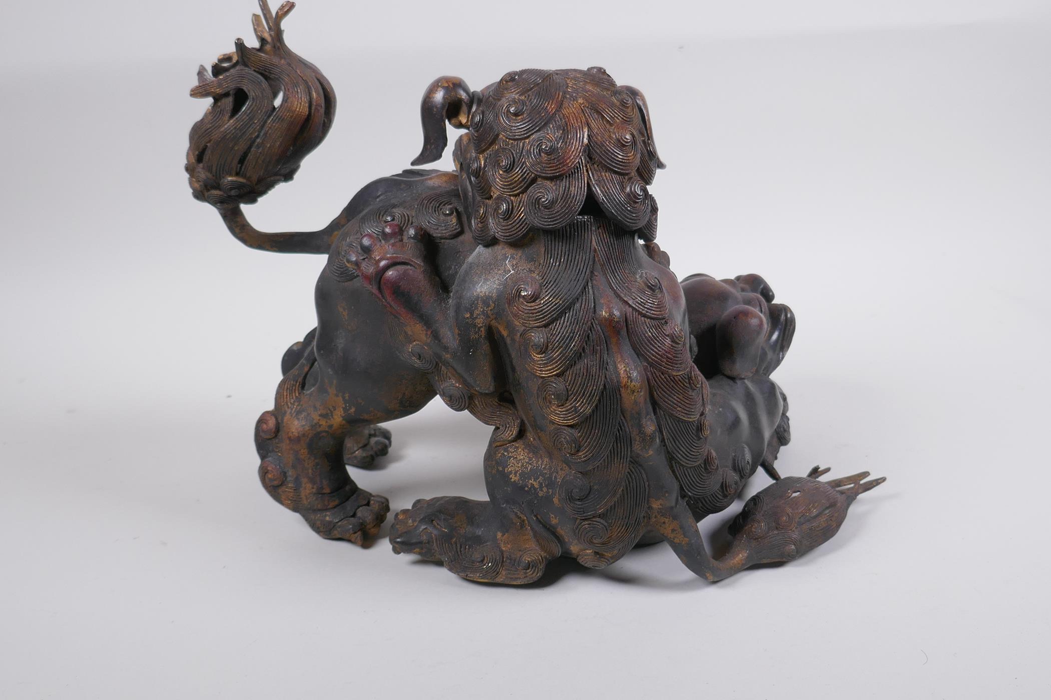 A Chinese gilt bronze censer in the form of two fo dogs, 24cm high - Image 4 of 4