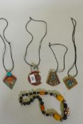 Four white metal pendants inset with coral and turquoise mosaic beads, 7cm long, and a bead necklace