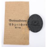 WW2 German Black Wound Badge in Paper Packet of Issue by Overhoff & Cie Ludenscheid