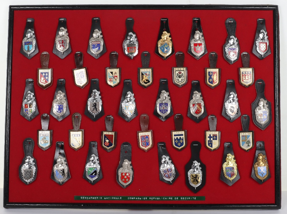 Collection of Obsolete Gendarmerie & CRS Police Nationale enamel badges on leather fobs