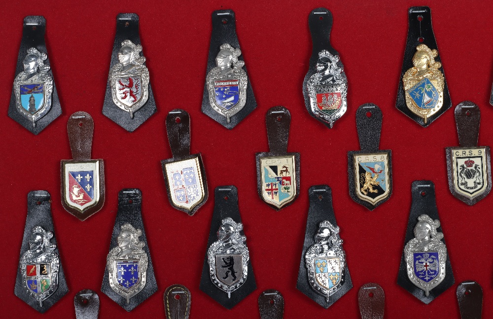 Collection of Obsolete Gendarmerie & CRS Police Nationale enamel badges on leather fobs - Image 2 of 3