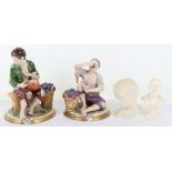 Two Rudolph Krammer figures of seated peasant boys