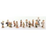 Goebel ‘Hummel’ porcelain figures, including Little Pharmacist, Soldier Boy, Merry Wanderer, Sensiti