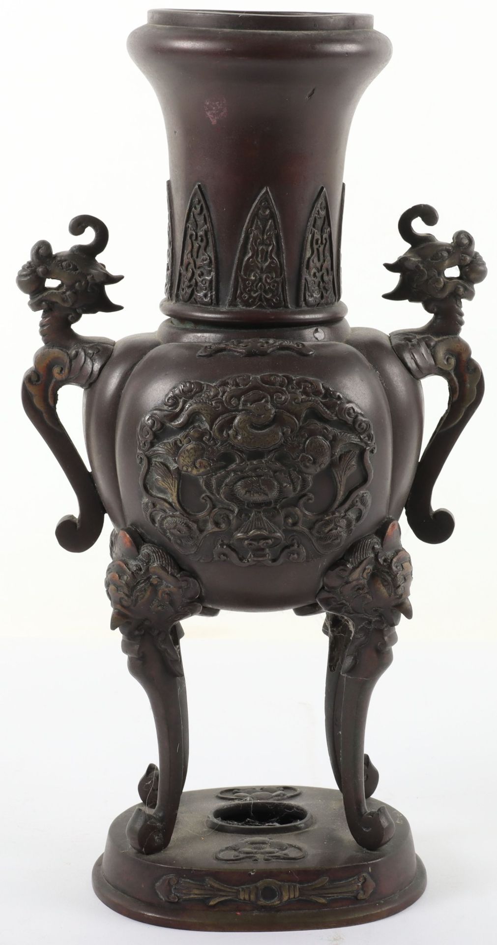 A Chinese archaic bronze vase on stand