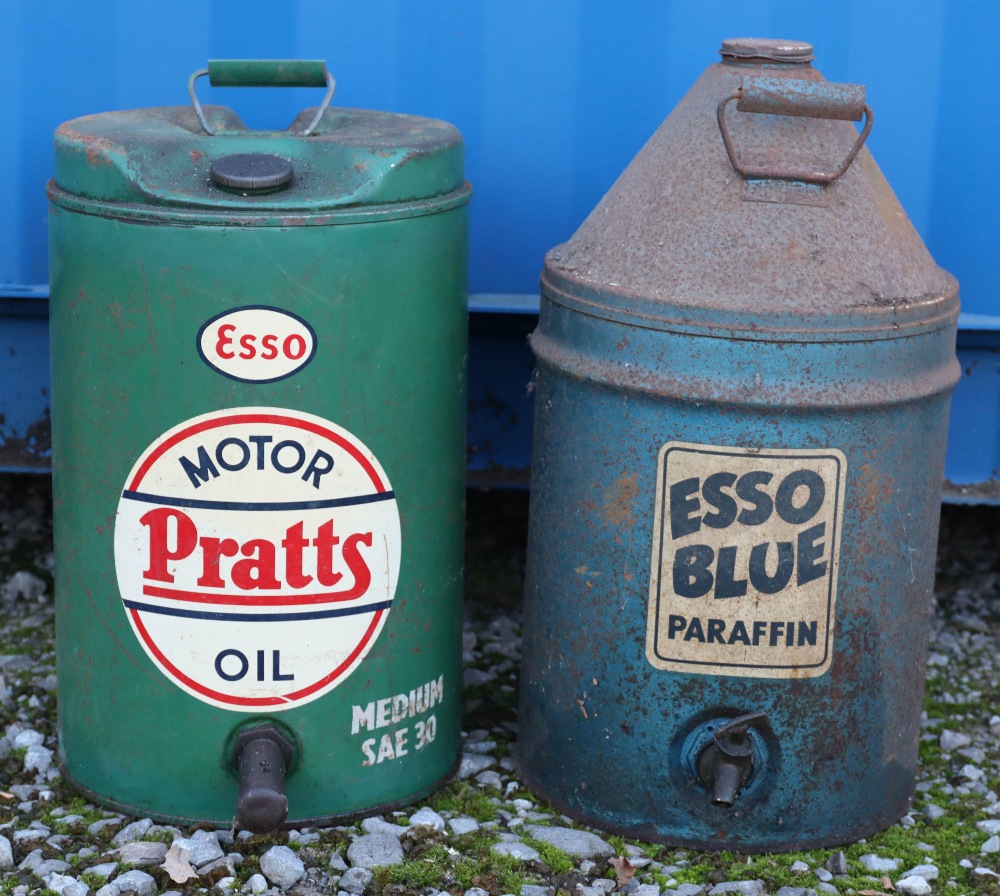 A Pratts Motor oil can and an Esso Blue Paraffin can