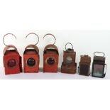 A selection of vintage petrol cans and Greenham lamps