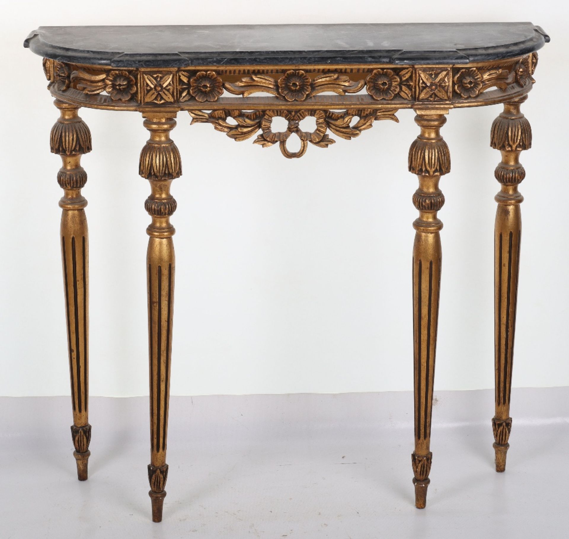 A French giltwood and marble top console table