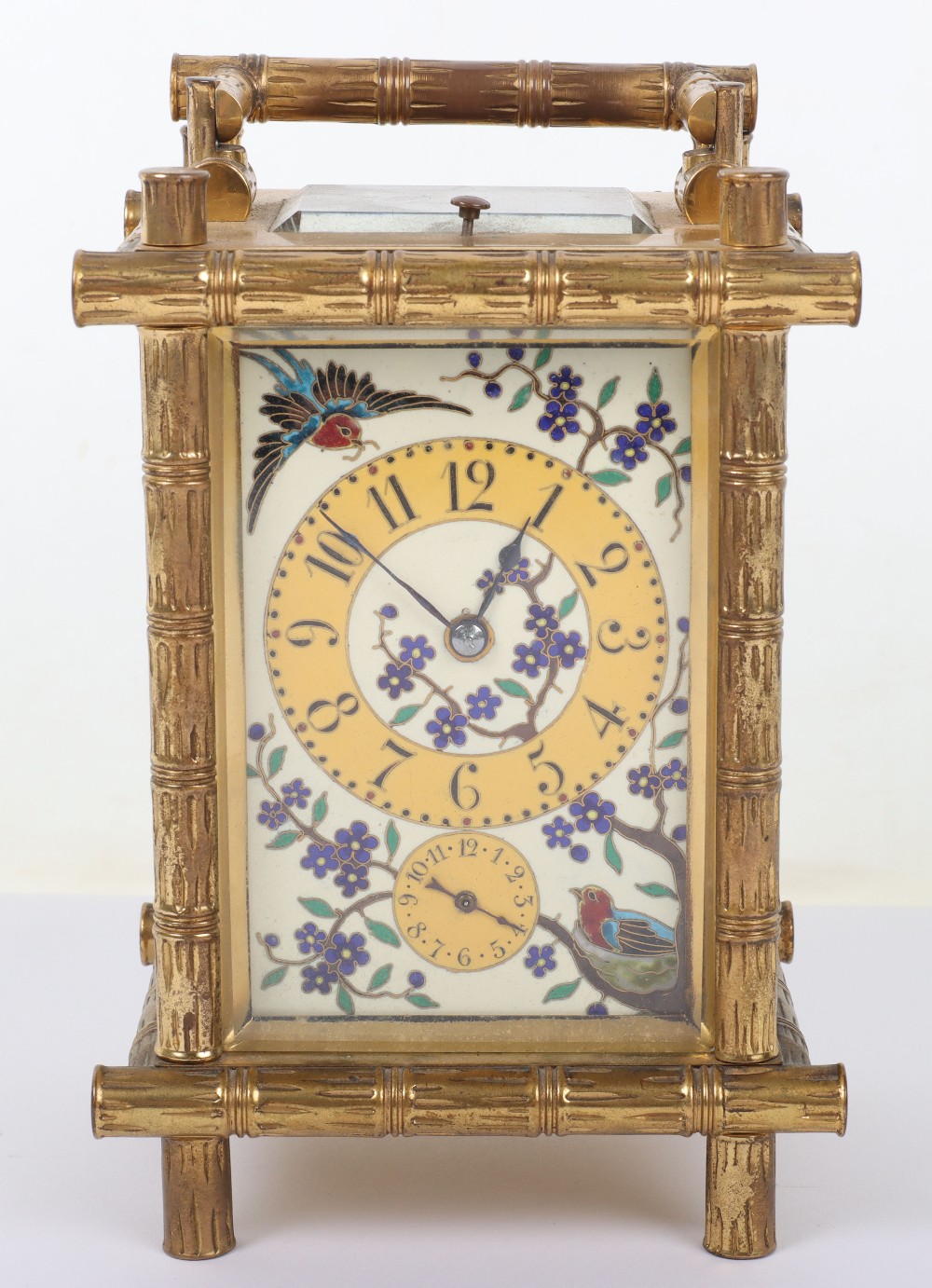 A fine 19th century gilt brass French Drocourt carriage clock with porcelain panel with cloisonne de