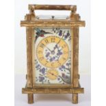 A fine 19th century gilt brass French Drocourt carriage clock with porcelain panel with cloisonne de