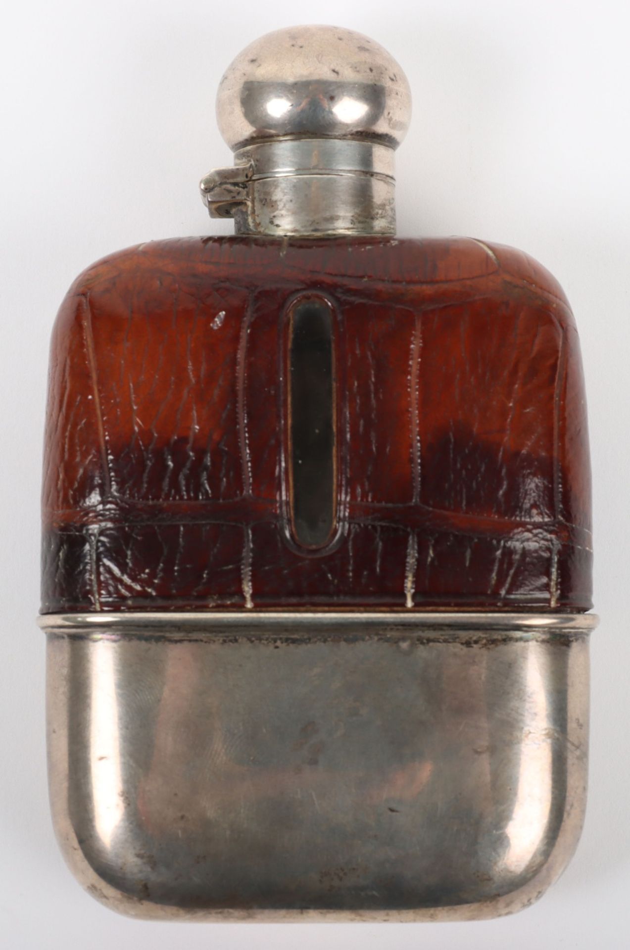 A late Victorian silver and leather hip flask