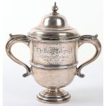 A Wolseley Cyclist Cup Competition silver lidded trophy, C.S. Harris & Sons, London 1907, engraved ‘