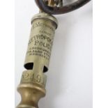 A Metropolitan Police whistle marked ‘The Metropolitan Patent Metropolitan Police J. Hudson & Co 244
