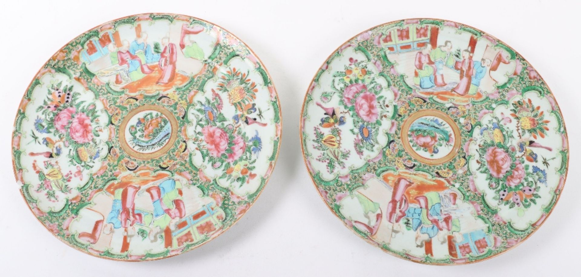 A pair of early 20th century Chinese Canton famille rose plates
