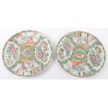 A pair of early 20th century Chinese Canton famille rose plates