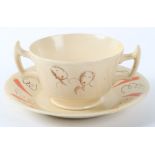 A Clarice Cliff for Wilkinson Bizarre pattern cup and saucer by Laura Knight