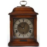 An Elliott of London oak cased Georgian style mantel clock