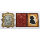 An 18th century portrait of a gentleman silhouette, signed below (unable to read)