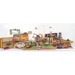 Collection of boxed tinplate wind-up track and other tinplate toys