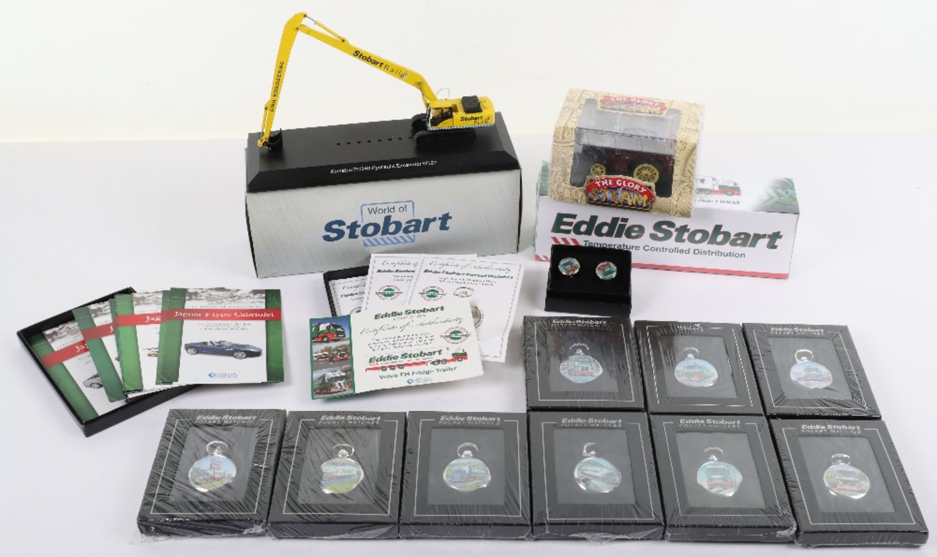 Quantity of Eddie Stobart atlas editions models and watches