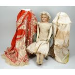 Early wax over composition shoulder head doll with provenance, in wooden box with clothes, English c