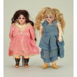 A pair of Simon & Halbig miniature bisque head dolls, German circa 1910,