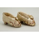 Rare early pair of 19th century ivory cream silk doll shoes,