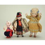 A group of three miniature all bisque dolls, German 1910,