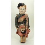 Unusual oil painted cloth doll in traditional Scottish uniform, probably American late 19th century,