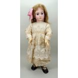 Rare and Large Jumeau Triste or ‘Long face’ bisque head Bebe doll, French circa 1880,