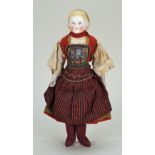 Parian-type shoulder head doll in original regional costume, German circa 1860,