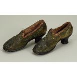 A miniature pair of leather shoes, early 19th century,