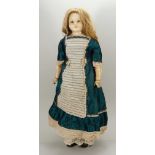 Wax over composition shoulder head doll, English circa 1860,