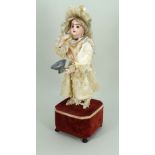 A ‘Little girl blowing Bubbles’ Roullet & Decamps Jumeau bisque head automata, French circa 1880,