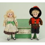 A pair of miniature all bisque dolls in original box, German circa 1900,