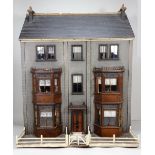 ‘Idaville’ a well-made three storey wooden Dolls House with original contents, made by Percy Platnau