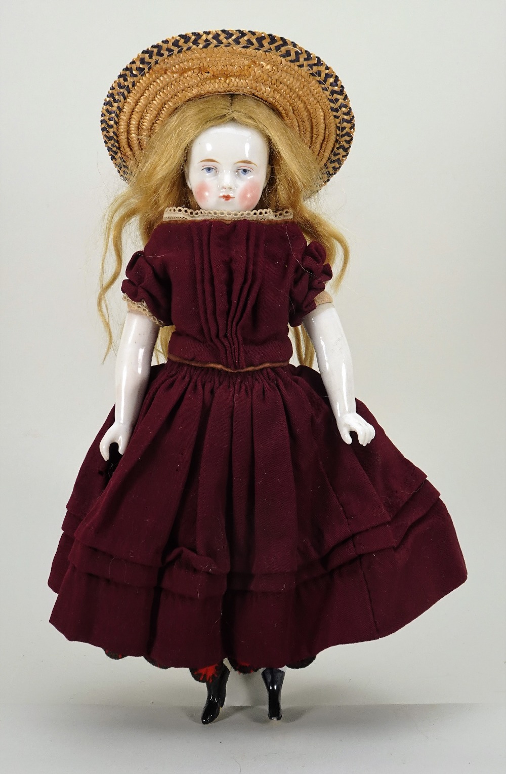Early glazed china shoulder head doll, German 1850s,