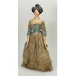 A good Papier-mache shoulder head doll with Apollo Knot hair-style on a milliner style body, German