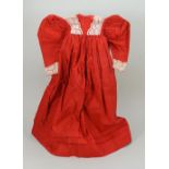 A good red cotton dress for large doll, 1880s,