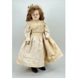 Early poured wax shoulder head doll, circa 1860,