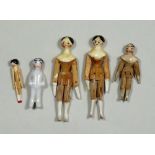 Three miniature painted wooden Grodnertal dolls, German 1830s,