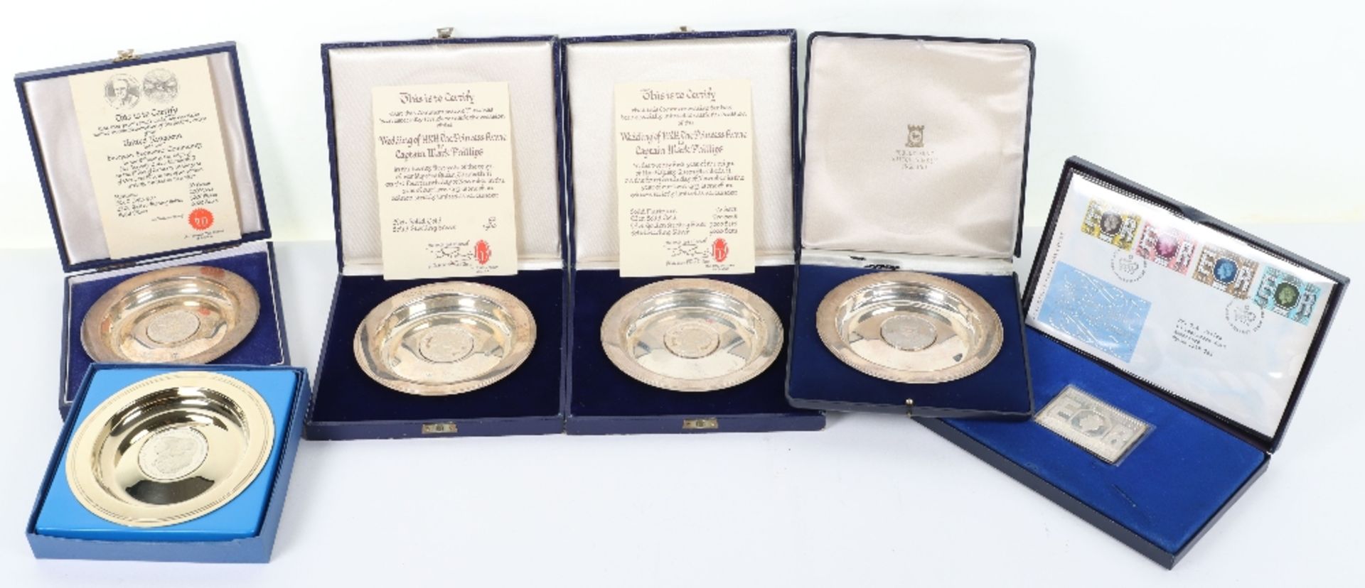 Four Franklin Mint silver commemorative plates